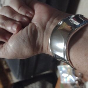 Silver toned clamp bracelet